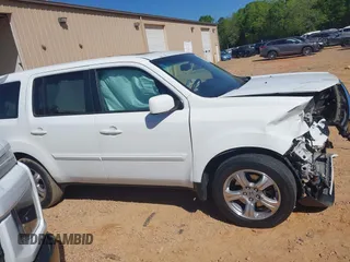 2014 Honda Pilot EX-L with VIN 5FNYF3H53EB025048, listed as a IAAI auction lot 42060266 with Not Provided miles and . Bid and sale history available at carsss.com. Image 13.