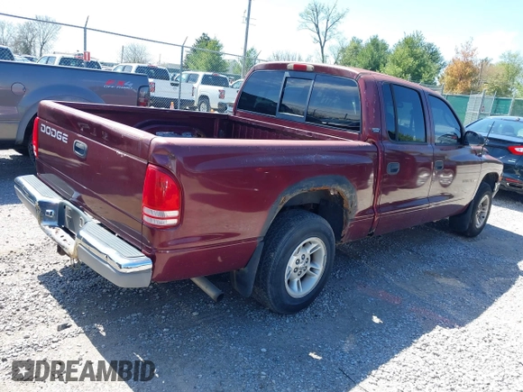 2000 Dodge Dakota Sport with VIN 1B7GL2AX7YS677544, listed as a IAAI auction lot 41965480 with 236,552 mi miles. Bid and sale history available at carsss.com. Image 4.
