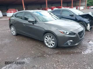 2016 Mazda 3 S Grand Touring z VIN JM1BM1N33G1277798, wystawiony jako IAAI lot #42337611 z przebiegiem 91 519 mil mil oraz . Historia ofert i sprzedaży dostępna na DreamBid. Obrazek 1.