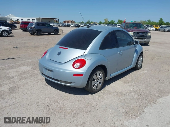 2009 Volkswagen New Beetle Coupe S with VIN 3VWPW31C59M503182, listed as a IAAI auction lot 41969191 with 61,880 mi miles. Bid and sale history available at carsss.com. Image 4.