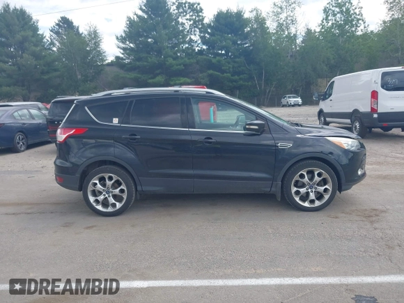 2015 Ford Escape Titanium with VIN 1FMCU9J92FUA96987, listed as a IAAI auction lot 42678423 with 188,956 mi miles and . Bid and sale history available at DreamBid. Image 13.