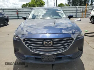 2018 Mazda CX-9 Touring with VIN JM3TCBCY3J0235048, listed as a Copart auction lot 61043915 with 82,869 mi miles and Salvage title. Bid and sale history available at DreamBid. Image 5.