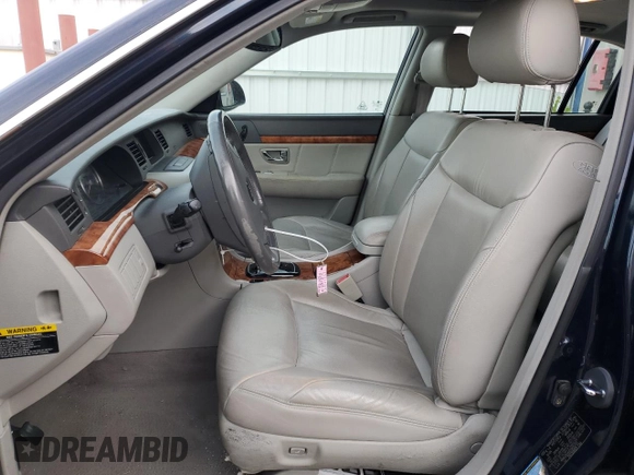 2005 Kia Amanti z VIN KNALD124055055725, wystawiony jako Copart lot #73573754 z przebiegiem 105 665 mil mil oraz Tytuł czysty. Historia ofert i sprzedaży dostępna na DreamBid. Obrazek 7.