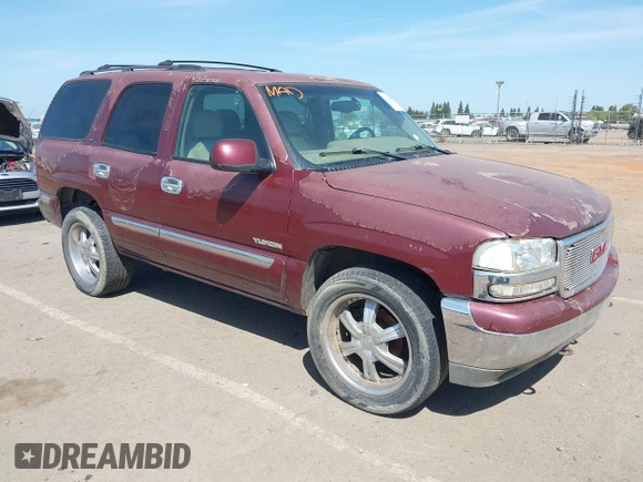 2001 GMC Yukon SLT with VIN 1GKEK13V81J100005, listed as a IAAI auction lot 42090494 with 276,042 mi miles. Bid and sale history available at carsss.com. Image 1.