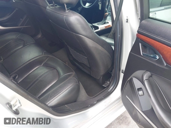 2012 Cadillac CTS Luxury with VIN 1G6DF5E59C0144574, listed as a IAAI auction lot 42116934 with 219,246 mi miles and . Bid and sale history available at DreamBid. Image 8.