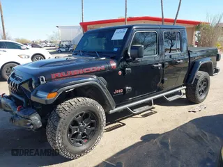 2020 Jeep Gladiator Rubicon z VIN 1C6JJTBG0LL117908, wystawiony jako IAAI lot #41621920 z przebiegiem 61 233 mil mil oraz . Historia ofert i sprzedaży dostępna na DreamBid. Obrazek 17.