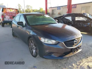 2014 Mazda Mazda6 i Touring with VIN JM1GJ1V62E1123248, listed as a IAAI auction lot 41827018 with 210,715 mi miles. Bid and sale history available at carsss.com. Image 1.