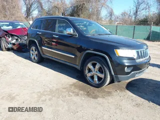2011 Jeep Grand Cherokee Overland with VIN 1J4RS6GGXBC659349, listed as a IAAI auction lot 41778399 with 219,624 mi miles and . Bid and sale history available at DreamBid. Image 1.