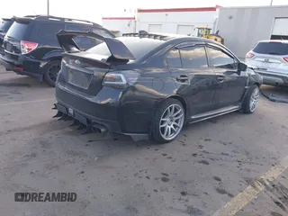 2016 Subaru WRX with VIN JF1VA1B63G9817632, listed as a IAAI auction lot 41818265 with 89,938 mi miles. Bid and sale history available at carsss.com. Image 4.