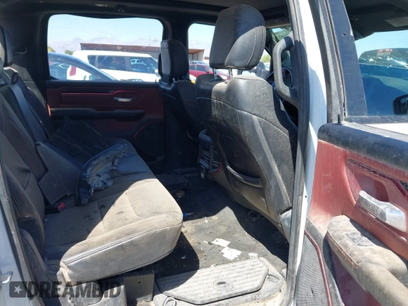 2022 Ram 1500 Rebel z VIN 1C6SRFLT4NN357352, wystawiony jako IAAI lot #41881613 z przebiegiem 31 285 mil mil oraz . Historia ofert i sprzedaży dostępna na DreamBid. Obrazek 8.