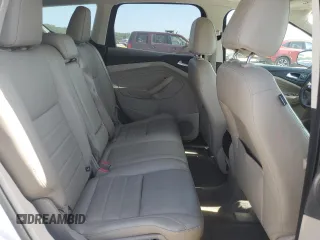 2013 Ford Escape SEL z VIN 1FMCU9H94DUC68911, wystawiony jako Copart lot #61671155 z przebiegiem 165 985 mil mil oraz Szkoda całkowita • Salvage title. Historia ofert i sprzedaży dostępna na DreamBid. Obrazek 11.