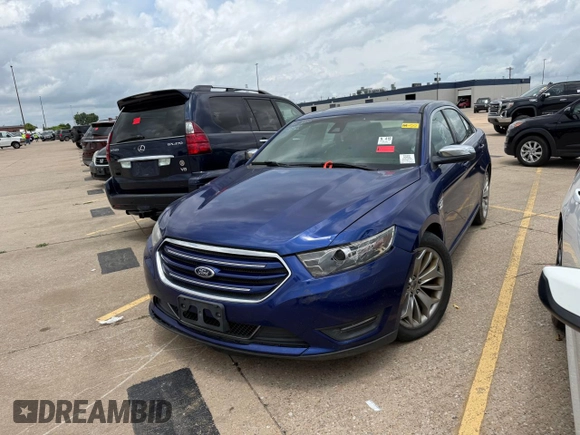 2014 Ford Taurus Limited with VIN 1FAHP2F84EG141388, listed as a Copart auction lot 61052645 with 112,876 mi miles and Clean title. Bid and sale history available at DreamBid. Image 2.