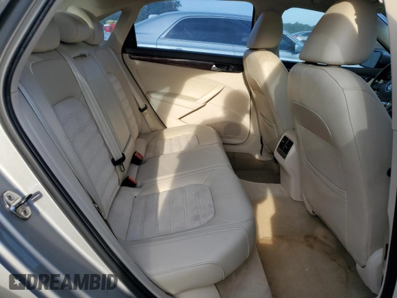 2013 Volkswagen Passat SEL Premium with VIN 1VWCH7A34DC039411, listed as a Copart auction lot 72908294 with 129,948 mi miles and Salvage Title. Bid and sale history available at carsss.com. Image 10.