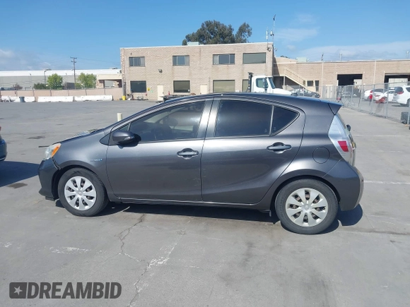 2014 Toyota Prius One with VIN JTDKDTB33E1061088, listed as a IAAI auction lot 42040762 with 206,735 mi miles and . Bid and sale history available at DreamBid. Image 14.