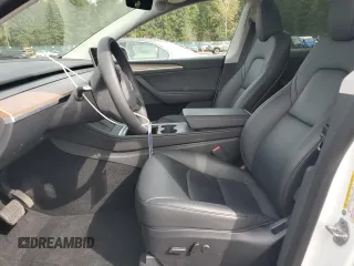 2023 Tesla Model Y Long Range with VIN 7SAYGDEE6PA101291, listed as a Copart auction lot 52758115 with 7,250 mi miles and Salvage Title. Bid and sale history available at DreamBid. Image 7.