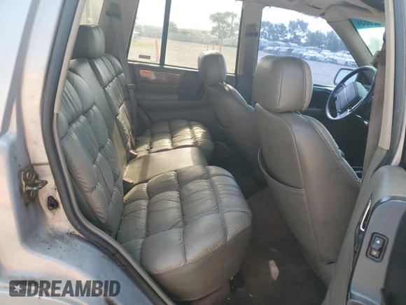 1994 Jeep Grand Cherokee Limited with VIN 1J4GZ78S1RC206288, listed as a Copart auction lot 62392685 with 207,731 mi miles and Salvage title. Bid and sale history available at DreamBid. Image 10.