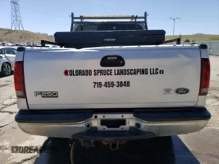 2001 Ford F-250 XL with VIN 1FTNX21F11ED05348, listed as a Copart auction lot 52098155 with 217,678 mi miles and Salvage Title. Bid and sale history available at DreamBid. Image 6.
