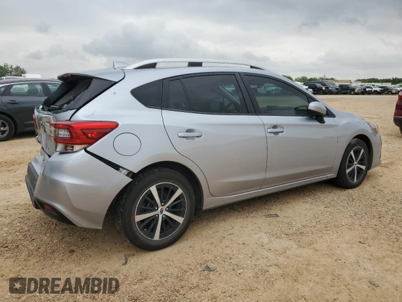 2023 Subaru Impreza Premium with VIN 4S3GTAD67P3713562, listed as a Copart auction lot 54821275 with 36,995 mi miles and Salvage title. Bid and sale history available at DreamBid. Image 3.
