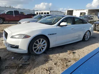 2016 Jaguar XJ R-Sport z VIN SAJWA1C77G8V92015, wystawiony jako Copart lot #77398654 z przebiegiem 97 407 mil mil oraz Czysty tytuł • Clean title. Historia ofert i sprzedaży dostępna na DreamBid. Obrazek 1.