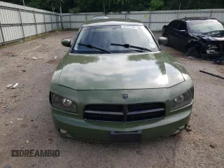 2010 Dodge Charger Police z VIN 2B3CA4CT7AH245139, wystawiony jako Copart lot #54257155 z przebiegiem 219 135 mil mil oraz Czysty tytuł • Clean title. Historia ofert i sprzedaży dostępna na DreamBid. Obrazek 5.