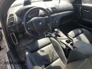 2012 BMW 1 Series 135i with VIN WBAUC9C52CVM12915, listed as a Copart auction lot 67145834 with 114,306 mi miles and Salvage title. Bid and sale history available at DreamBid. Image 8.