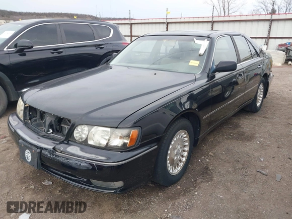 1999 Infiniti Q45 z VIN JNKBY31A3XM602466, wystawiony jako IAAI lot #41721377 z przebiegiem 113 158 mil mil oraz . Historia ofert i sprzedaży dostępna na DreamBid. Obrazek 17.