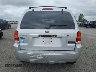 2005 Ford Escape Hybrid with VIN 1FMCU96H75KC95236, listed as a Copart auction lot 54528685 with 186,511 mi miles and Clean title. Bid and sale history available at DreamBid. Image 6.