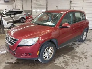 2011 Volkswagen Tiguan SE with VIN WVGBV7AX9BW000461, listed as a IAAI auction lot 42032028 with 149,896 mi miles and . Bid and sale history available at DreamBid. Image 2.