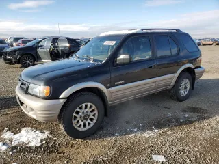 2001 Honda Passport LX z VIN 4S6DM58W014404165, wystawiony jako Copart lot #81636614 z przebiegiem 157 744 mil mil oraz Czysty tytuł • Clean title. Historia ofert i sprzedaży dostępna na DreamBid. Obrazek 1.