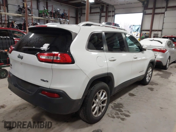 2015 Jeep Cherokee Latitude z VIN 1C4PJMCB4FW635406, wystawiony jako IAAI lot #41168412 z przebiegiem 131 089 mil mil oraz . Historia ofert i sprzedaży dostępna na DreamBid. Obrazek 4.