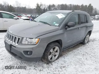 2013 Jeep Compass Sport with VIN 1C4NJDBB4DD280285, listed as a IAAI auction lot 41338884 with 119,714 mi miles. Bid and sale history available at carsss.com. Image 2.