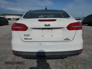 2015 Ford Focus SE with VIN 1FADP3F2XFL220072, listed as a Copart auction lot 58058255 with 128,871 mi miles and Clean title. Bid and sale history available at DreamBid. Image 6.