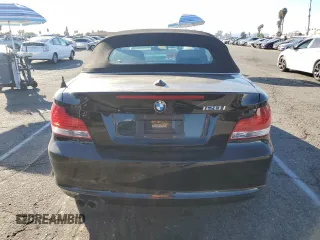2010 BMW 1 Series 128i with VIN WBAUN1C56AVH82146, listed as a Copart auction lot 79296544 with 79,976 mi miles and Salvage title. Bid and sale history available at DreamBid. Image 6.