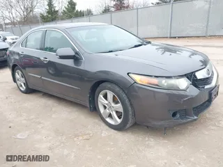 2009 Acura TSX with VIN JH4CU26629C033049, listed as a IAAI auction lot 41969918 with 122,772 mi miles. Bid and sale history available at carsss.com. Image 1.