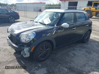 2013 MINI Countryman S z VIN WMWZC3C5XDWP24270, wystawiony jako IAAI lot #42232550 z przebiegiem 95 512 mil mil oraz . Historia ofert i sprzedaży dostępna na DreamBid. Obrazek 2.