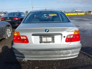 1999 BMW 3 Series 323i with VIN WBAAM3330XKC56332, listed as a IAAI auction lot 41200762 with 157,004 mi miles. Bid and sale history available at carsss.com. Image 16.