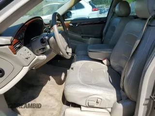 2003 Cadillac DeVille z VIN 1G6KD54Y63U250482, wystawiony jako Copart lot #52164515 z przebiegiem 131 376 mil mil oraz Szkoda całkowita • Salvage title. Historia ofert i sprzedaży dostępna na DreamBid. Obrazek 7.