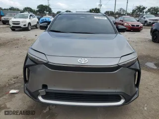 2024 Toyota bZ4X XLE with VIN JTMAAAAA9RA032841, listed as a Copart auction lot 72791844 with 8,833 mi miles and Salvage Title. Bid and sale history available at carsss.com. Image 5.