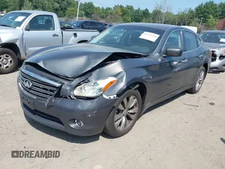2012 Infiniti M with VIN JN1BY1AR3CM390550, listed as a IAAI auction lot 42797466 with 177,338 mi miles and . Bid and sale history available at DreamBid. Image 2.