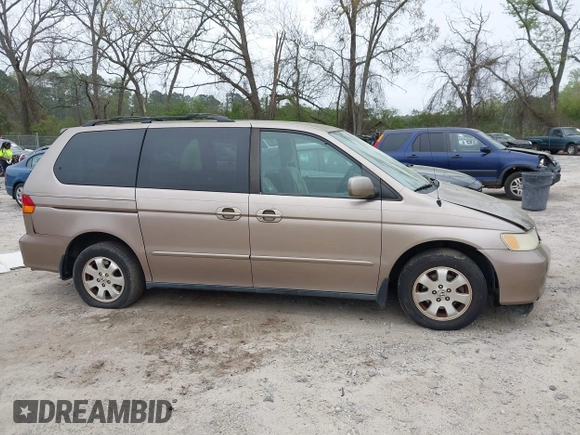 2004 Honda Odyssey EX with VIN 5FNRL18684B072343, listed as a IAAI auction lot 41945142 with 222,990 mi miles and . Bid and sale history available at DreamBid. Image 13.