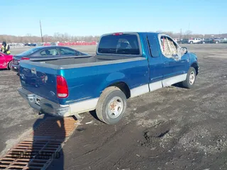2001 Ford F-150 XL with VIN 1FTRX17W71NA81344, listed as a IAAI auction lot 41840571 with 143,938 mi miles and . Bid and sale history available at DreamBid. Image 4.