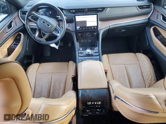 2023 Jeep Grand Cherokee Summit Reserve with VIN 1C4RJKEG8P8723399, listed as a Copart auction lot 51033365 with 32,689 mi miles and Salvage title. Bid and sale history available at DreamBid. Image 8.