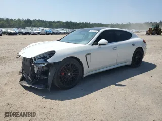 2016 Porsche Panamera 4 with VIN WP0AA2A79GL000127, listed as a Copart auction lot 56220614 with 76,065 mi miles and Salvage Title. Bid and sale history available at carsss.com. Image 1.