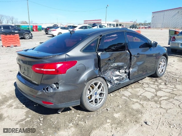 2015 Ford Focus SE with VIN 1FADP3F22FL264972, listed as a IAAI auction lot 41674698 with 117,376 mi miles. Bid and sale history available at carsss.com. Image 4.