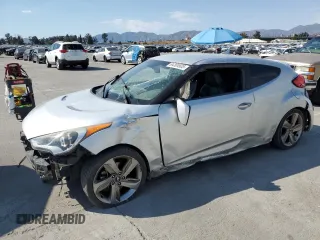 2015 Hyundai Veloster Turbo с VIN KMHTC6AEXFU223063, выставлен на аукционе Copart как лот 64304935 с пробегом 156 191 миль миль и Списание • Salvage title. История ставок и продаж доступна на DreamBid. Изображение 1.
