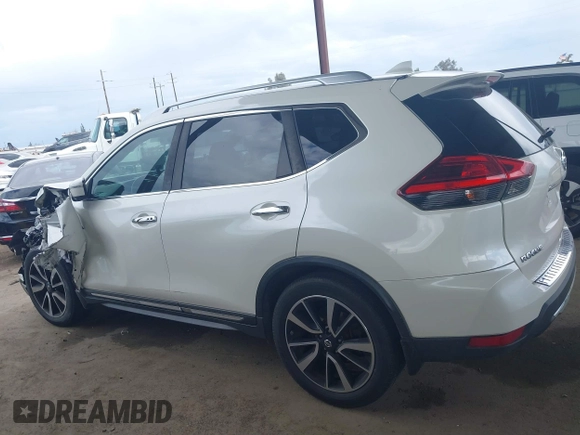 2017 Nissan Rogue SL with VIN JN8AT2MT7HW143035, listed as a IAAI auction lot 41771987 with 77,696 mi miles and . Bid and sale history available at DreamBid. Image 14.