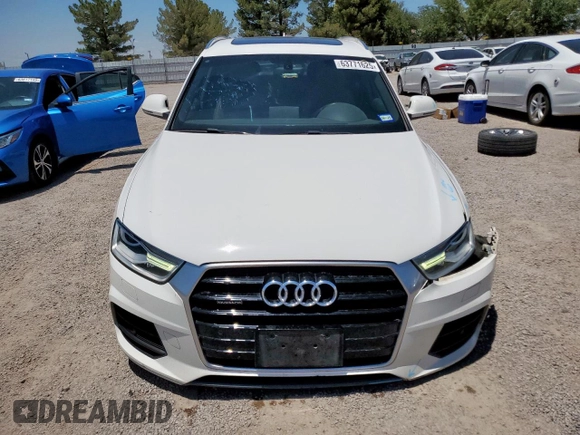 2016 Audi Q3 Premium Plus with VIN WA1EFCFS0GR019940, listed as a Copart auction lot 63771625 with 98,591 mi miles and Salvage title. Bid and sale history available at DreamBid. Image 5.