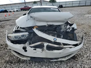 2015 BMW 4 Series 428i xDrive with VIN WBA4A7C53FD415066, listed as a Copart auction lot 61880545 with 130,874 mi miles and Salvage title. Bid and sale history available at DreamBid. Image 5.