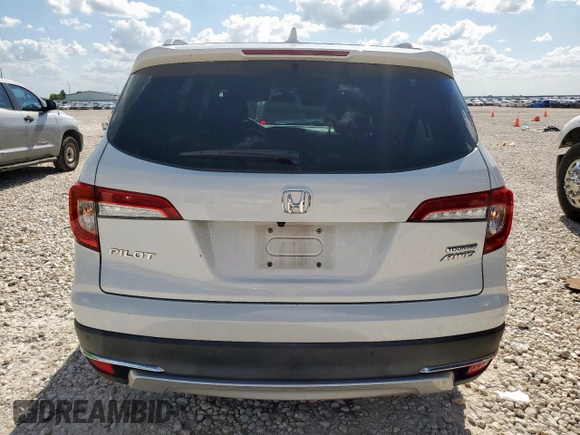 2020 Honda Pilot Touring 7-Passenger with VIN 5FNYF6H69LB018905, listed as a Copart auction lot 61209685 with 61,637 mi miles and Salvage title. Bid and sale history available at DreamBid. Image 6.
