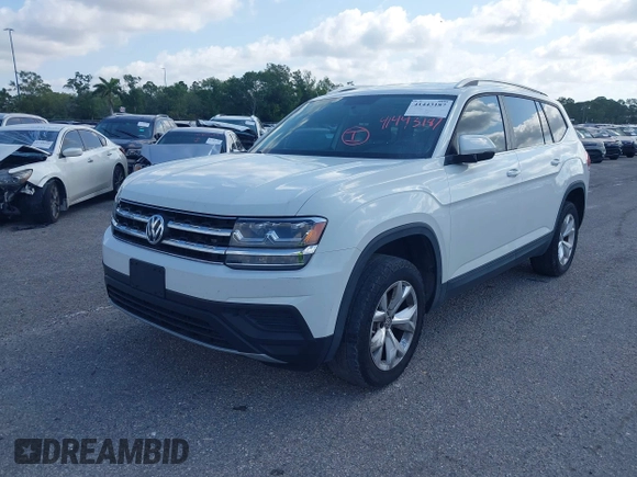 2018 Volkswagen Atlas S с VIN 1V2AP2CAXJC540812, выставлен на аукционе IAAI как лот 41443187 с пробегом 83 511 миль миль и . История ставок и продаж доступна на DreamBid. Изображение 2.